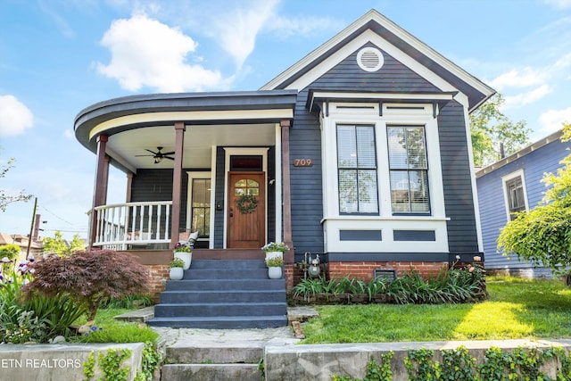 view of front of house featuring a porch and a ceiling fan