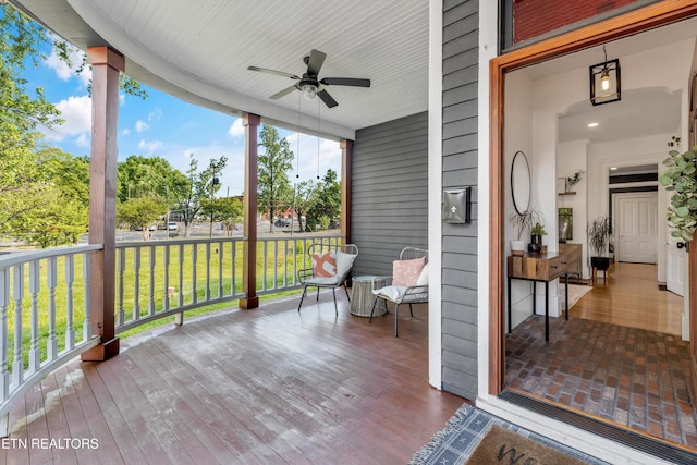 deck featuring a ceiling fan