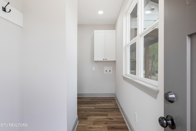 clothes washing area with recessed lighting, cabinet space, washer hookup, baseboards, and dark wood finished floors
