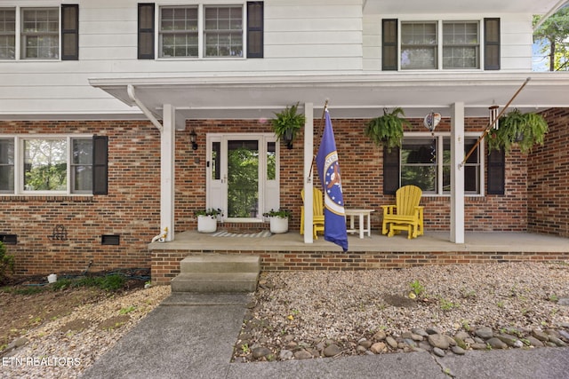 705 Kimbee Rd, Knoxville, TN 37923 - view of exterior entry with covered porch and brick siding