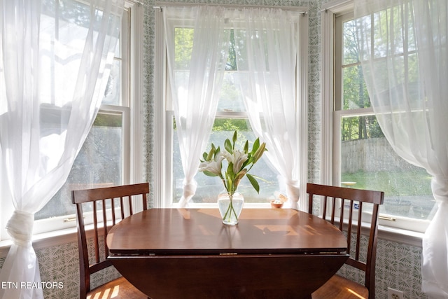 705 Kimbee Rd, Knoxville, TN 37923 - dining room featuring wallpapered walls and wood finished floors