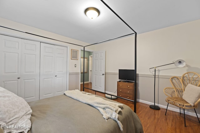 705 Kimbee Rd, Knoxville, TN 37923 - bedroom with baseboards, wood finished floors, and a closet