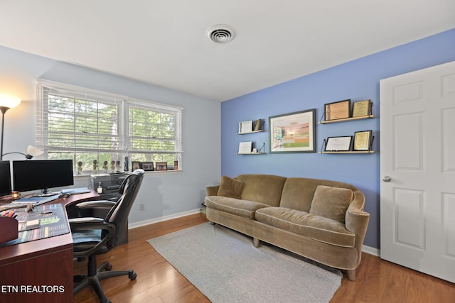 705 Kimbee Rd, Knoxville, TN 37923 - home office featuring visible vents, baseboards, and wood finished floors