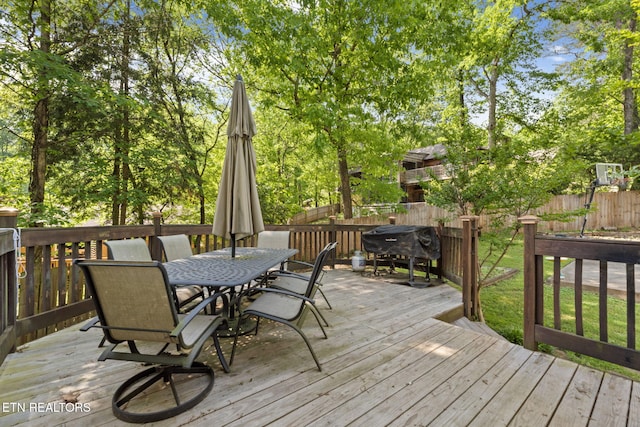 705 Kimbee Rd, Knoxville, TN 37923 - wooden deck featuring fence, outdoor dining space, and a grill