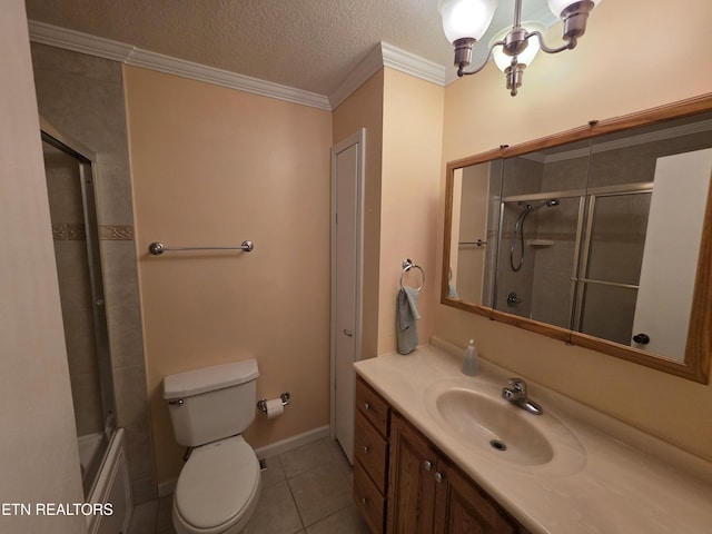 bathroom featuring crown molding, vanity, tile patterned floors, toilet, and a chandelier