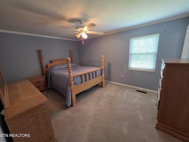 bedroom featuring visible vents, crown molding, light carpet, baseboards, and ceiling fan