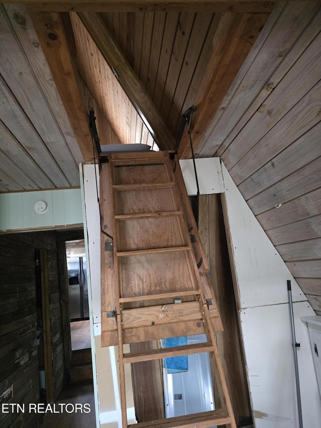 staircase featuring wooden ceiling