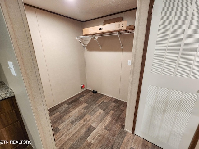 laundry room featuring wood finished floors