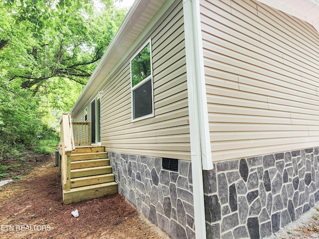 view of home's exterior featuring crawl space