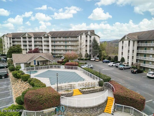 view of pool with fence