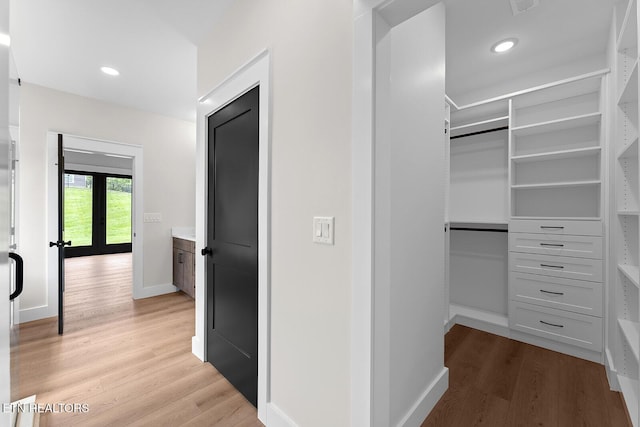 922 Eagle Point Dr, Loudon, TN 37774 - walk in closet featuring light wood-type flooring