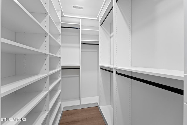 922 Eagle Point Dr, Loudon, TN 37774 - spacious closet featuring dark wood-style flooring and visible vents