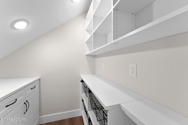922 Eagle Point Dr, Loudon, TN 37774 - laundry room with baseboards and dark wood-type flooring