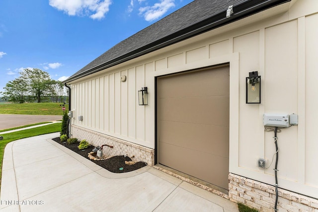 922 Eagle Point Dr, Loudon, TN 37774 - doorway to property with stone siding, board and batten siding, and roof with shingles