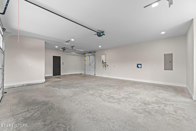 922 Eagle Point Dr, Loudon, TN 37774 - garage with electric panel, tankless water heater, baseboards, and recessed lighting
