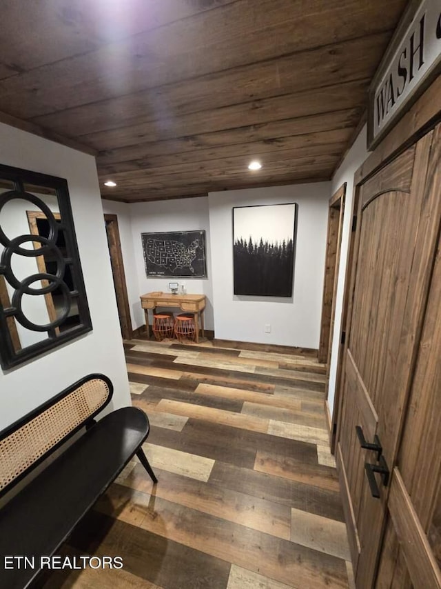 hallway featuring recessed lighting, wood finished floors, and wood ceiling