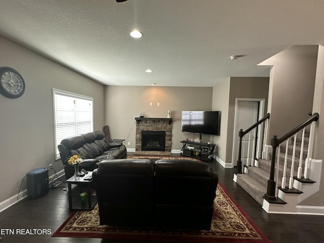 1631 Silver Spur Ln, Knoxville, TN 37932 - living room with a fireplace, wood finished floors, stairs, and baseboards
