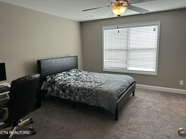 1631 Silver Spur Ln, Knoxville, TN 37932 - carpeted bedroom with visible vents, a ceiling fan, and baseboards