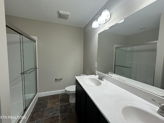 1631 Silver Spur Ln, Knoxville, TN 37932 - full bathroom with baseboards, a stall shower, and a sink