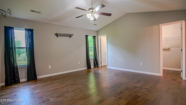645 Bryce View Ln, Sevierville, TN 37876 - spare room featuring visible vents, dark wood-style flooring, baseboards, ceiling fan, and vaulted ceiling
