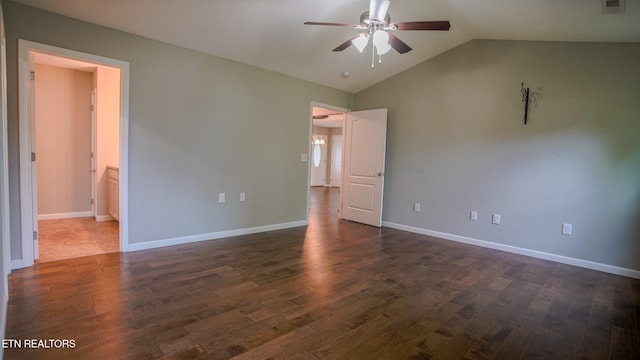 645 Bryce View Ln, Sevierville, TN 37876 - unfurnished bedroom featuring ceiling fan, baseboards, dark wood-style floors, lofted ceiling, and ensuite bath