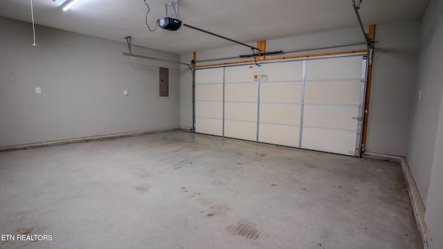 645 Bryce View Ln, Sevierville, TN 37876 - garage with a garage door opener and electric panel