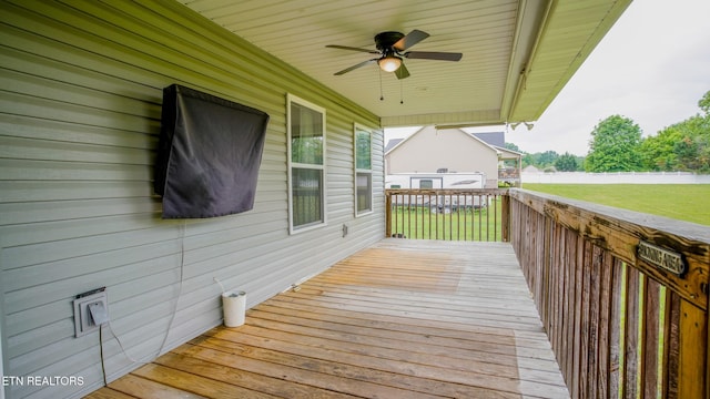 645 Bryce View Ln, Sevierville, TN 37876 - wooden deck featuring a lawn and a ceiling fan