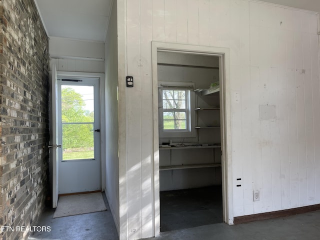 interior space with unfinished concrete floors