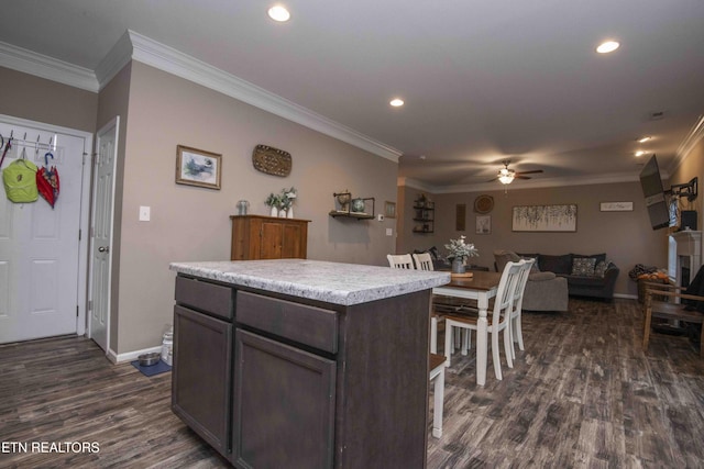kitchen featuring ornamental molding, ceiling fan, dark wood finished floors, baseboards, and recessed lighting