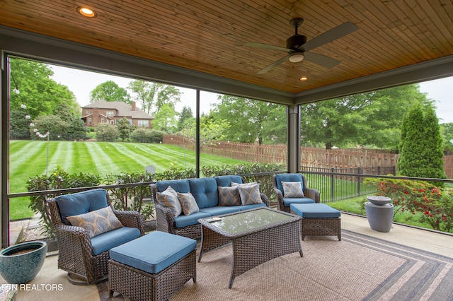 view of patio with outdoor lounge area, ceiling fan, and a fenced backyard