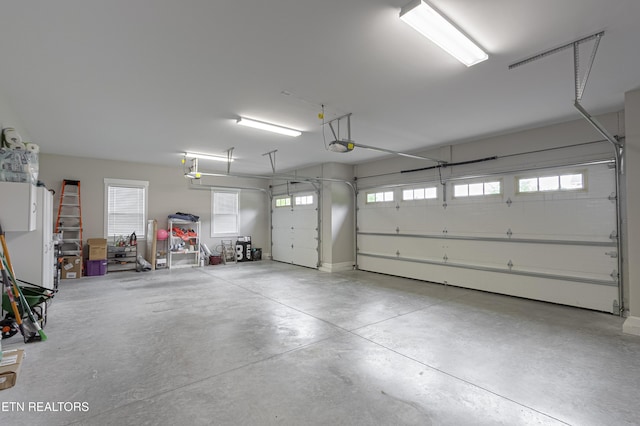 garage featuring a garage door opener