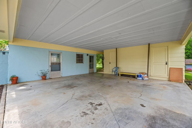view of patio with a carport