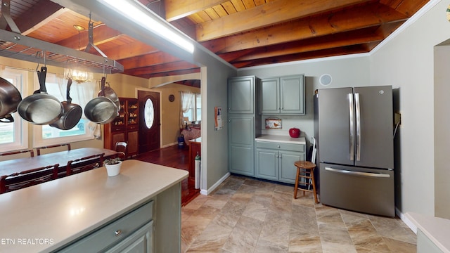220 Lovelady Ln, Dayton, TN 37321 - kitchen with light countertops, wood ceiling, freestanding refrigerator, and beam ceiling