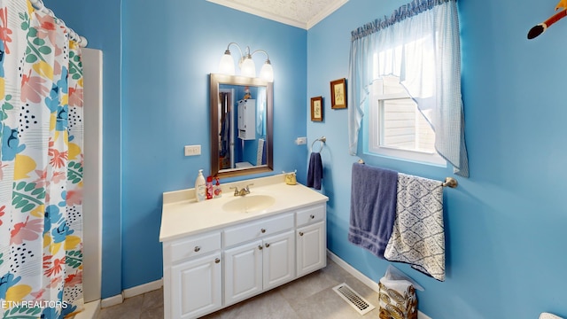 220 Lovelady Ln, Dayton, TN 37321 - bathroom with vanity, ornamental molding, baseboards, and visible vents