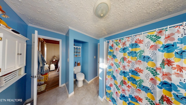220 Lovelady Ln, Dayton, TN 37321 - bathroom with crown molding, tile patterned flooring, toilet, a shower with shower curtain, and baseboards