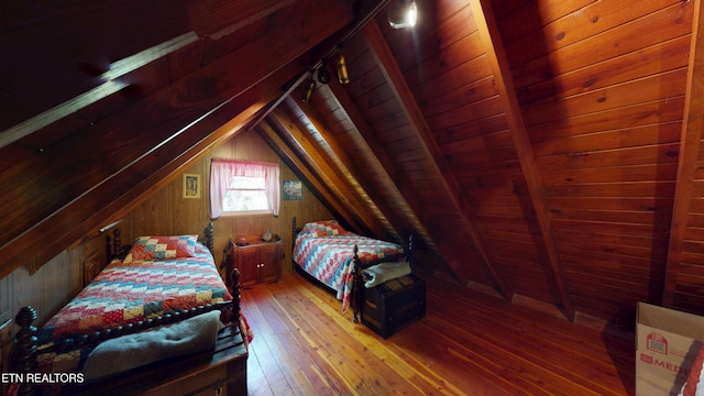 220 Lovelady Ln, Dayton, TN 37321 - bedroom with wood ceiling, lofted ceiling with beams, wood walls, and hardwood / wood-style floors