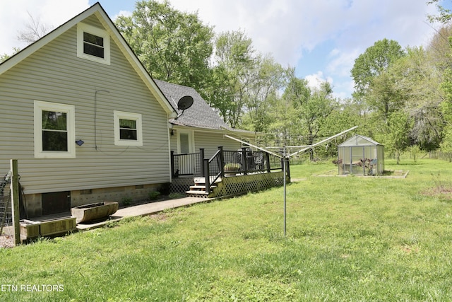 220 Lovelady Ln, Dayton, TN 37321 - rear view of house with a deck, a yard, a greenhouse, crawl space, and an outbuilding