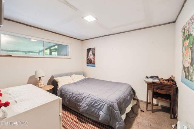 bedroom with ornamental molding