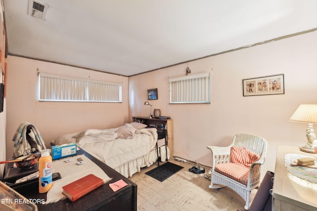 bedroom with visible vents