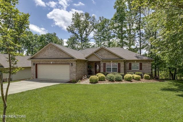 160 Kawga Way, Loudon, TN 37774 - single story home featuring roof with shingles, brick siding, a front lawn, concrete driveway, and an attached garage