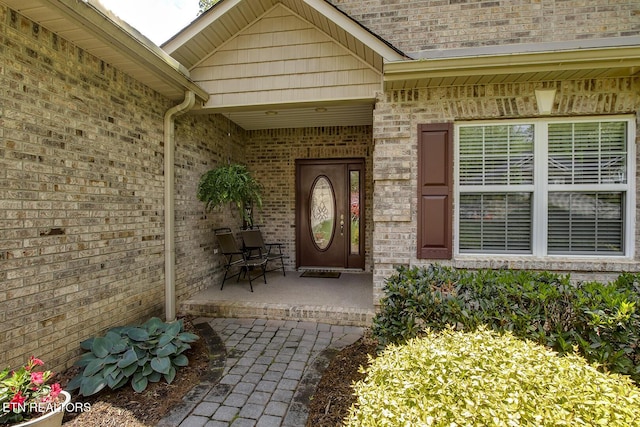 160 Kawga Way, Loudon, TN 37774 - view of exterior entry featuring a porch and brick siding