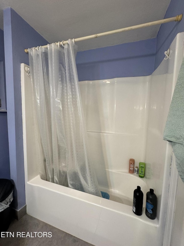 full bathroom with shower / bath combination with curtain
