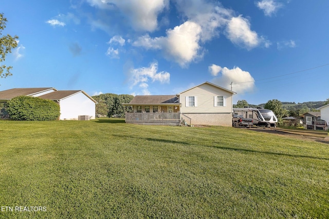 352 St Edward Dr, Dandridge, TN 37725 - rear view of house featuring central air condition unit and a yard