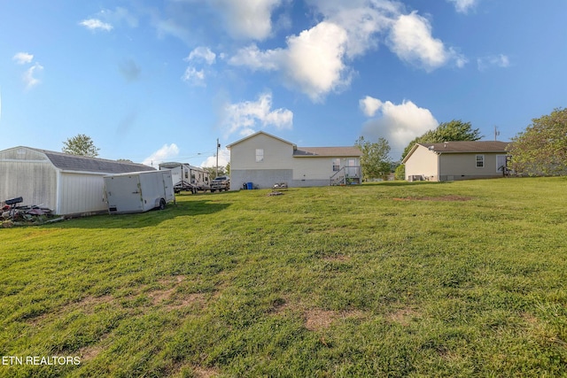 352 St Edward Dr, Dandridge, TN 37725 - view of yard featuring an outdoor structure and a shed