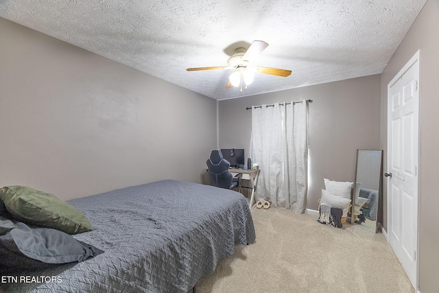352 St Edward Dr, Dandridge, TN 37725 - carpeted bedroom with baseboards, a textured ceiling, and ceiling fan