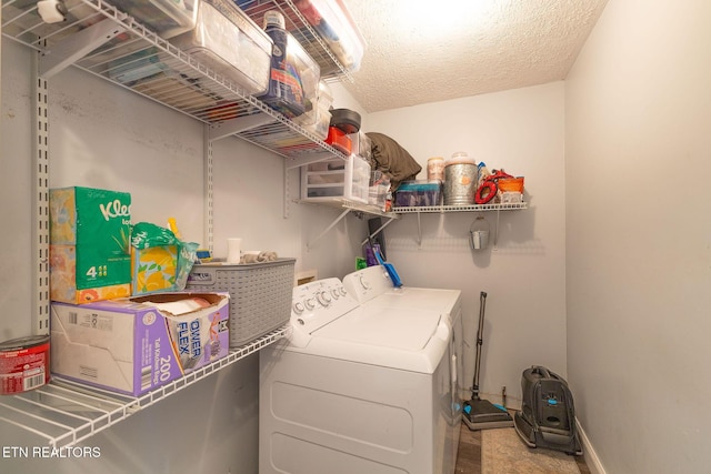 352 St Edward Dr, Dandridge, TN 37725 - washroom with laundry area, washer and clothes dryer, a textured ceiling, and baseboards