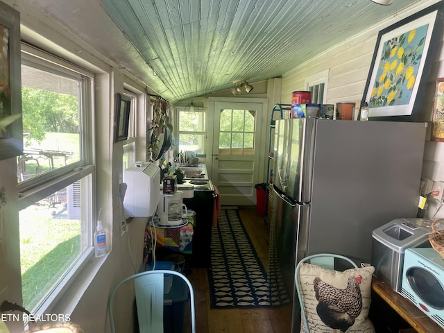 sunroom / solarium featuring a healthy amount of sunlight