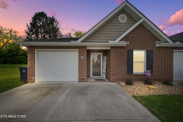 ranch-style house featuring concrete driveway, brick siding, and an attached garage