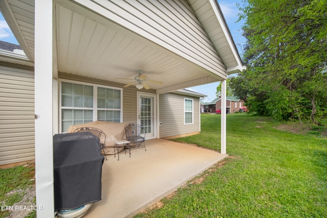 view of patio featuring ceiling fan and grilling area