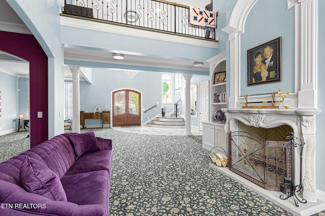 367 Barnsley Rd, Farragut, TN 37934 - carpeted living area with arched walkways, ornamental molding, baseboards, ornate columns, and french doors
